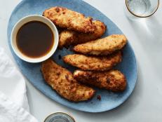 Cooking Channel serves up this Crunchy Parmesan Chicken Tenders recipe from Giada De Laurentiis plus many other recipes at CookingChannelTV.com
