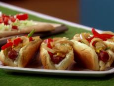 Cooking Channel serves up this Fully Loaded Bacon-Wrapped Hot Dogs recipe from Lisa Lillien plus many other recipes at CookingChannelTV.com