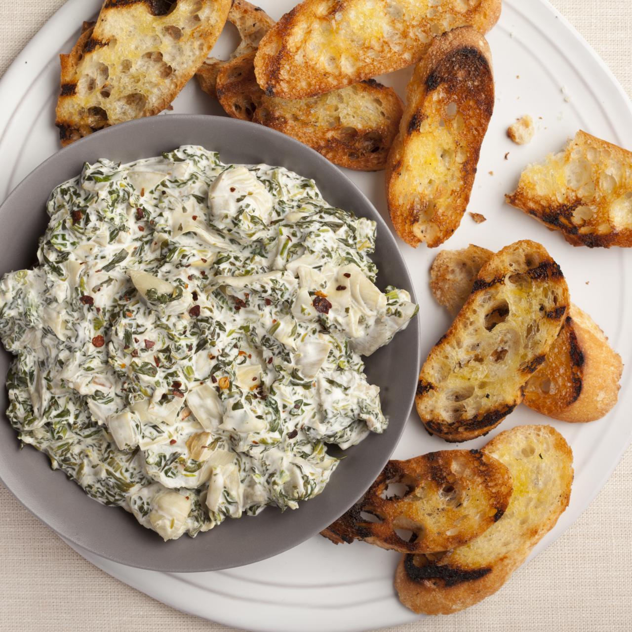 https://cook.fnr.sndimg.com/content/dam/images/cook/fullset/2012/9/15/0/Thanksgiving-2011_EA1F08-spinach-artichoke-dip_s4x3.jpg.rend.hgtvcom.1280.1280.suffix/1371233173958.jpeg