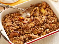 Cooking Channel serves up this Peach Almond Crumble recipe from Michael Symon plus many other recipes at CookingChannelTV.com