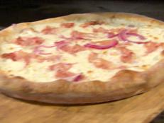 Cooking Channel serves up this Lemon Pizza recipe from Bobby Flay plus many other recipes at CookingChannelTV.com