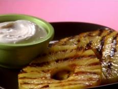 Cooking Channel serves up this Hungry Grilled Pineapple with So-Good Cinnamon-Vanilla Yogurt Dip recipe from Lisa Lillien plus many other recipes at CookingChannelTV.com