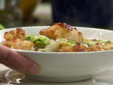 Cooking Channel serves up this Escarole Soup with Caesar Croutons recipe from Rachael Ray plus many other recipes at CookingChannelTV.com