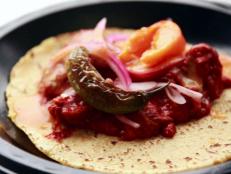 Cooking Channel serves up this Guisados' Cochinita Pibil Tacos recipe  plus many other recipes at CookingChannelTV.com