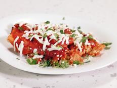 Cooking Channel serves up this Chicken Enchiladas recipe from Rachael Ray plus many other recipes at CookingChannelTV.com