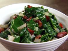 Cooking Channel serves up this Quick-Braised Greens with Bacon and Sweet Onions recipe from Aida Mollenkamp plus many other recipes at CookingChannelTV.com