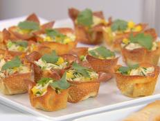 Cooking Channel serves up this Crab Salad in Crisp Wonton Cups recipe from Ellie Krieger plus many other recipes at CookingChannelTV.com