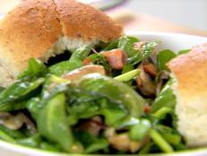 Cooking Channel serves up this Spinach Salad with Warm Bacon and Apple Cider Dressing recipe from Ellie Krieger plus many other recipes at CookingChannelTV.com