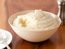 Cooking Channel serves up this Mashed Potatoes with Roasted Garlic and Mascarpone Cheese recipe from Bobby Flay plus many other recipes at CookingChannelTV.com