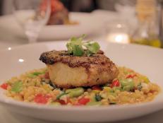 Cooking Channel serves up this Wild Striped Bass with Favas and Couscous recipe from Debi Mazar and Gabriele Corcos plus many other recipes at CookingChannelTV.com