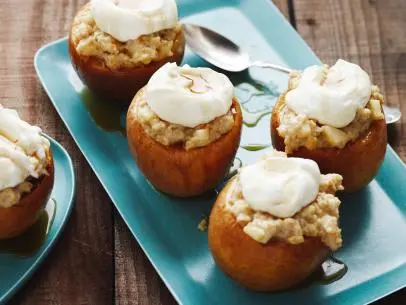 BAKED APPLE WITH OATMEAL AND YOGURT, Bobby Flay, Brunch @ Bobby’s/Vermont Bed
and Breakfast Style, Food Network, Apples, Lemon, Unsalted Butter, Light Brown Muscovado
Sugar, Ground Cinnamon, Apple Cider, Whole Milk, Orange Zest, Quick-­Cooking-­Steel-­Cut
Oatmeal, Low-­Fat Greek Yogurt
