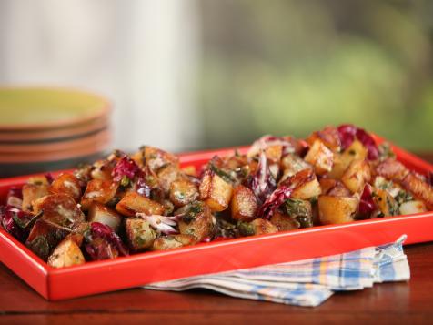 Cast-Iron Home Fries with Roasted Green Chiles, Cilantro, Green Onions, Radicchio, and Creamy Garlic Dressing