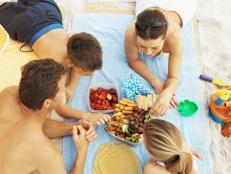 elevated view of a family having a picnic at the beach