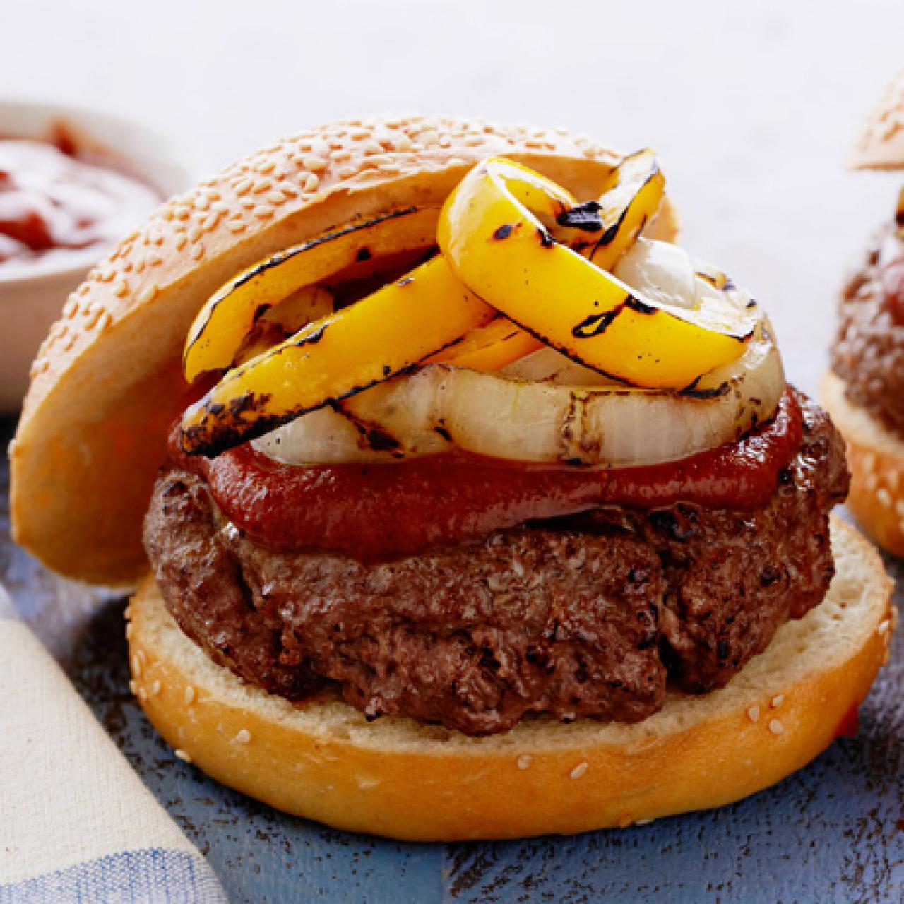 https://cook.fnr.sndimg.com/content/dam/images/cook/fullset/2013/5/21/0/CCKitchens_burger-toppings-grilled-tomato-ketchup-with-onions-peppers-recipe_s4x3.jpg.rend.hgtvcom.1280.1280.suffix/1369161419647.jpeg