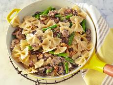 Cooking Channel serves up this Creamy Farfalle with Cremini, Asparagus, and Walnuts recipe from Giada De Laurentiis plus many other recipes at CookingChannelTV.com