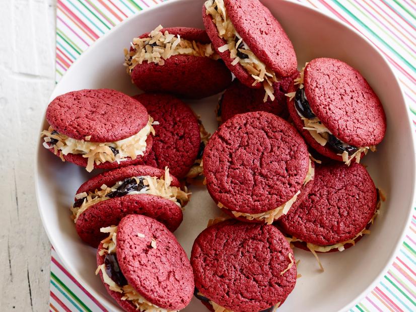 CHERRY COCONUT WHOOPIE PIES
Chuck Hughes
Cooking Channel
Allpurpose
Flour, Unsweetened Cocoa Powder, Baking Powder, Baking Soda, Fine Salt, Red
Sour Cherries, Sugar, Unsalted Butter, Red Food Coloring, Vanilla Extract, Eggs, Powdered
Gelatin, Whipping Cream, Toasted Unsweetened Coconut, Coconut Extract