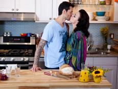 Gabriele Corcos and his wife Debi Mazar in the kitchen, as seen on Cooking Channel's Extra Virgin, Season 4.