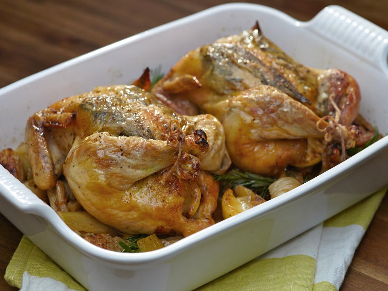 https://cook.fnr.sndimg.com/content/dam/images/cook/fullset/2014/3/11/0/CCTIFSP1_Roast-Chicken-Stuffed-with-Lemon-and-Rosemary-recipe_s4x3.jpg.rend.hgtvcom.1280.960.suffix/1394564825969.jpeg