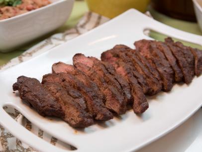 Host Rev Run and Russy's steak, as seen on Cooking Channel's Rev Runs Sunday Suppers, Season 1.