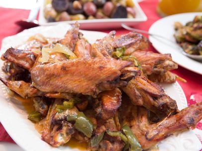 Perry's roasted turkey wings with onion and peppers, as seen on Cooking Channel's Rev Runs Sunday Suppers, Season 1.
