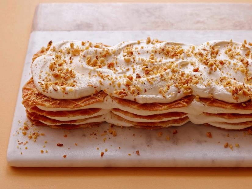 MAPLEWAFFLE
ICEBOX CAKE
Cooking Channel
Heavy Cream, Sour Cream, Maple Syrup, Butter Waffle Cookies, Walnuts