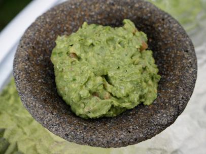 Fresh Guacamole featured dip for Olga and Carlos Gonzalez’s backyard party, as seen on Cooking Channel’s My Grandmother’s Ravioli, Season 3.