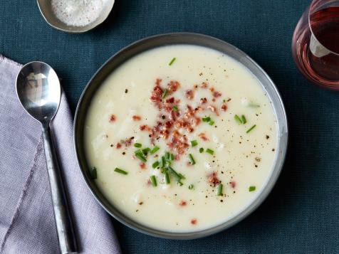 Creamy Cauliflower Soup with Aged Cheddar Pancetta, and Sauteed Leeks