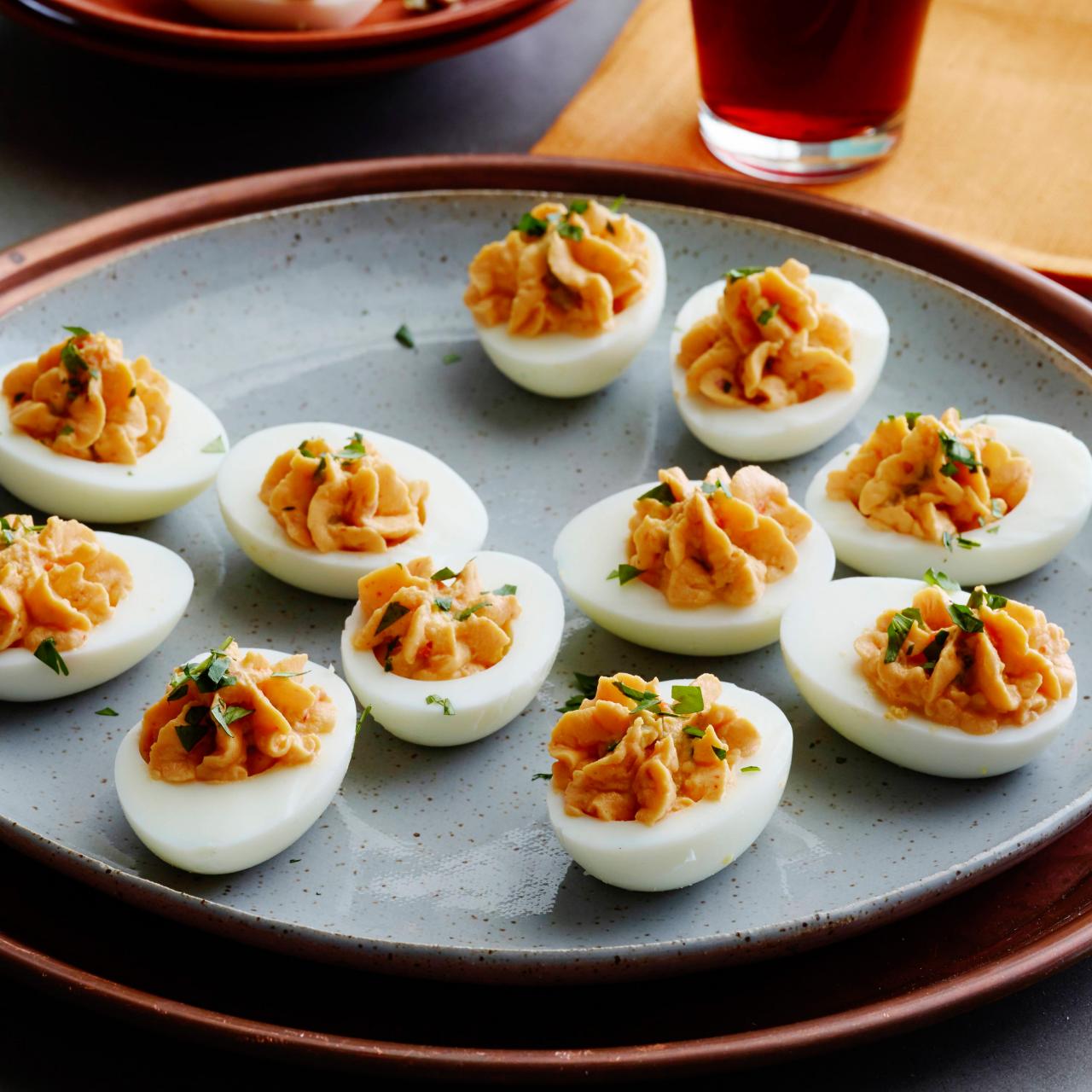 https://cook.fnr.sndimg.com/content/dam/images/cook/fullset/2014/9/22/0/CCKEL507_thai-deviled-eggs-and-beet-pickled-Hungarian-deviled-eggs-recipe_s4x3.jpg.rend.hgtvcom.1280.1280.suffix/1411407788626.jpeg