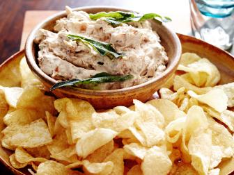 CARAMELIZED ONION AND SAGE DIP:
(Served with regular potato chips)
Susan Vu
Cooking Channel
Unsalted Butter, Sage Leaves, Onions, Kosher Salt, Sour Cream, Cream Cheese, Potato
Chips