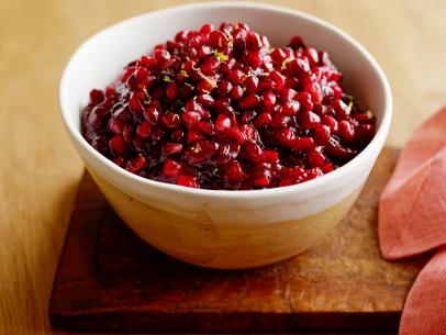 CRANBERRY, APPLE AND POMEGRANATE SAUCE:
(Canned cranberry sauce)
Cooking Channel
Jellied Cranberry Sauce, Fresh or Frozen Whole Cranberries, Apple, Lemon,
Pomegranate Seeds