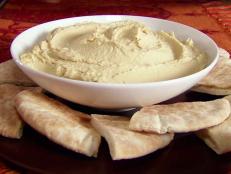 For an easy dip, try Alton Brown's Hummus for Real recipe from Good Eats on Food Network. Slow-cooked chickpeas add extra smoothness.