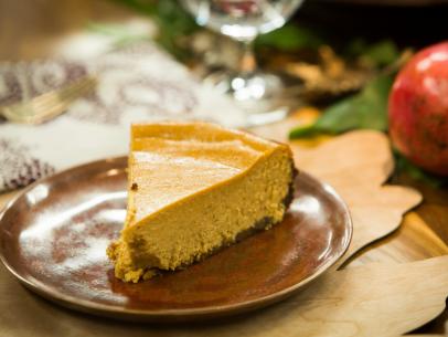 Pumpkin cheesecake with a bacon crumble crust, as seen on Cooking Channel's Tia Mowry at Home, Season 2.