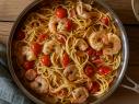 Cory Hardrict adds cherry tomatoes to his garlicky shrimp scampi for a bright finish.