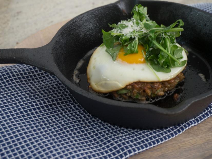 Farro topped with a fried egg and arugula prepared by Host Haylie Duff along with her mom Susan Duff as seen on the Cooking Channel's Real Girl's Kitchen, Season 2.