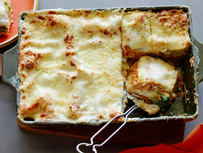 PUMPKIN LOVERS LASAGNA
Rachael Ray
Rachael Ray’s Week In A Day/Fall In Love With Fall
Cooking Channel
Kosher Salt, Escarole, Garlic, Butter, Sage Leaves, Butternut Squash, Chicken Stock,
Allpurpose
Flour, Milk, Nutmeg, Pumpkin Puree, Eggs, Ricotta, ParmigianoReggiano,
Noboil
Flat Lasagna, Italian Fontina