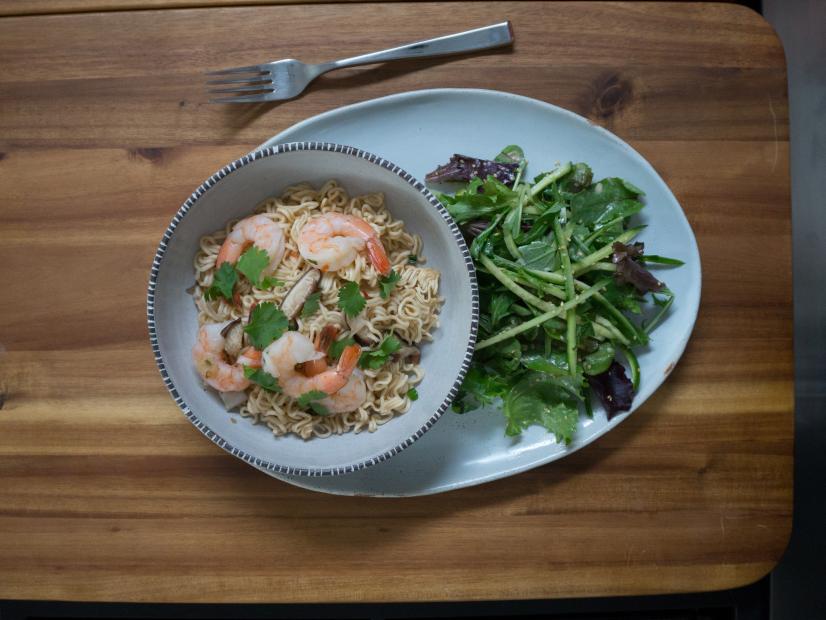 Pouched ramen with shrimp accompanied by a delicious salad prepared by Host Haylie Duff and her friend Kurt Finney as seen on the Cooking Channel's Real Girl's Kitchen, Season 2.