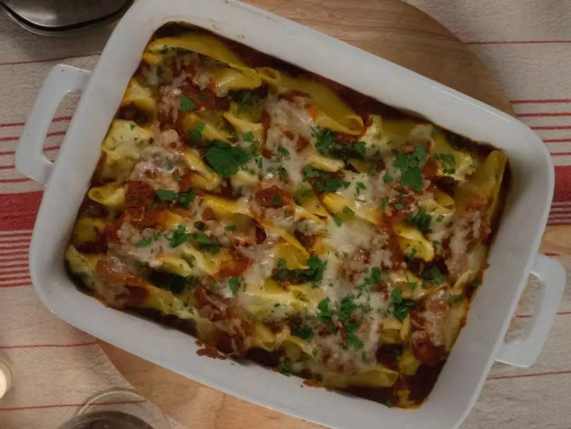 Three cheese stuffed pasta bathed in a slow roasted tomato sauce with beef bone baked to perfection as seen on the Cooking Channel's Real Girl's Kitchen with Host Haylie Duff, Season 2.