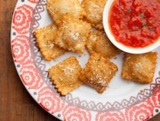 Cooking Channel serves up this Fried Ravioli recipe  plus many other recipes at CookingChannelTV.com