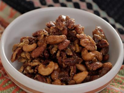 An amazing sweet and spicy snack, these honey roasted nut clusters are baked with brown sugar, honey and a little cayenne pepper for kick as seen on Cooking Channel's Real Girl's Kitchen with Host Haylie Duff, Season 2.
