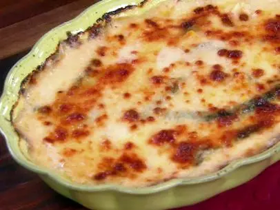 Potato and poblano gratin is topped with grated Monterey Jack cheese.