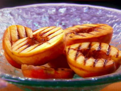 Tequila grilled peaches are served as a side.