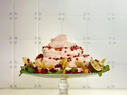 Swiss Meringue Tower with Pomegranate & Passion Fruit recipe prepared by UpRooted host Sarah Sharratt for her Christmas feast.