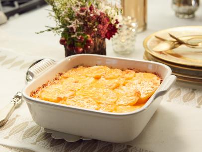 Host Tiffani Amber Thiessen's dish, Cheesy Potatos au Gratin, as seen on Cooking Channel’s Dinner at Tiffani’s, Christmas Special.