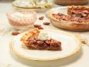 Host Tiffani Amber Thiessen's dish, Pecan Pie and Vanilla Whipped Cream, as seen on Cooking Channel’s Dinner at Tiffani’s, Christmas Special.