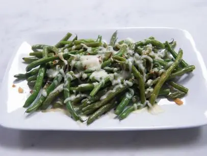 Patti LaBelle's string beans with mozzarella dish, as seen on Cooking Channel’s Patti LaBelle's Place, Season 1.