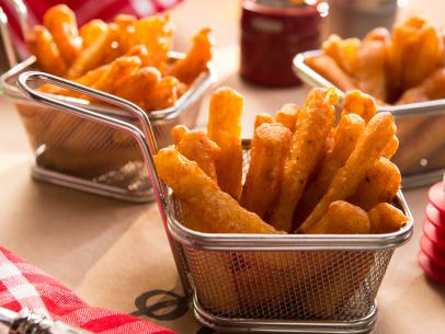 Beer Battered Fries prepared by host Tiffani Amber Theissen for Burgers and Beer night with friends and family, as seen on Cooking Channel's Dinner at Tiffani's, Season 2.