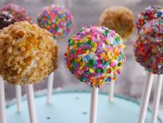 Cooking Channel serves up this Stick and Pop's Birthday Cake Pops recipe  plus many other recipes at CookingChannelTV.com