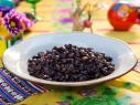 Beauty shot of the Cuban Style Black Beans during Fiesta Night,  as seen on Cooking Channel's Dinner at Tiffani's, Season 2.