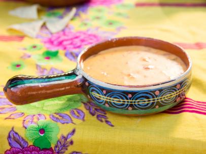 Beauty shot of the Slow cooker Texas Queso during Fiesta Night, as seen on Cooking Channel's Dinner at Tiffani's, Season 2.