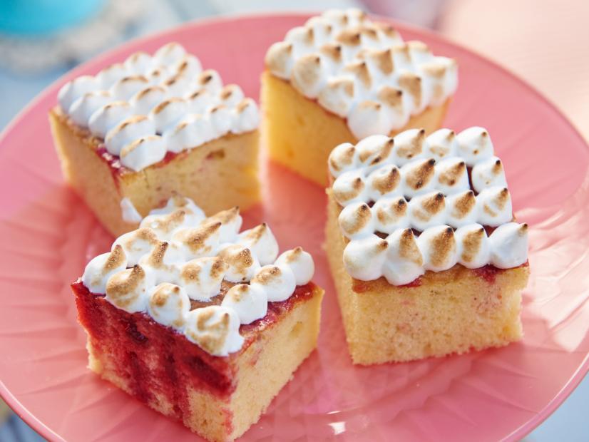 Hosts Tori Spelling and Dean McDermott's dish, Strawberry-Lemon Poke Cake with Italian Meringue, for their Spring Picnic, as seen on Cooking Channel’s Tori & Dean Specials, Tori & Dean’s Spring Picnic.